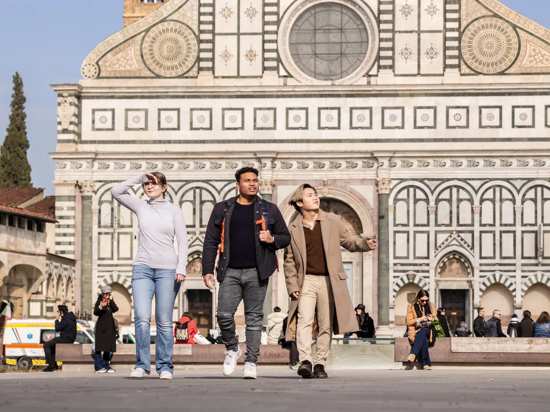 Students walking on the street in Florence, Italy.