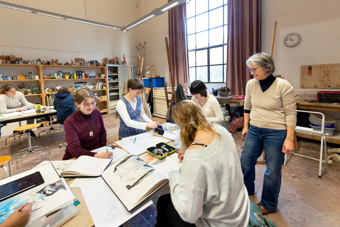 Students working in an art classroom.