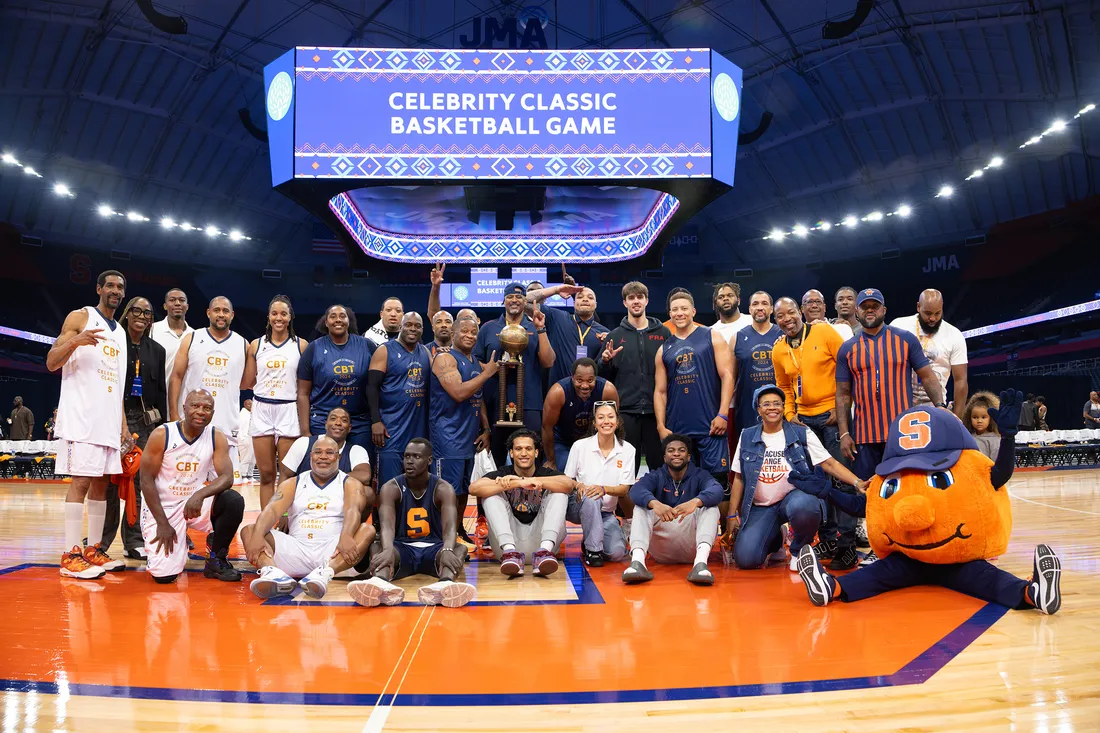 People inside the Dome posting for a picture, after basketball game.