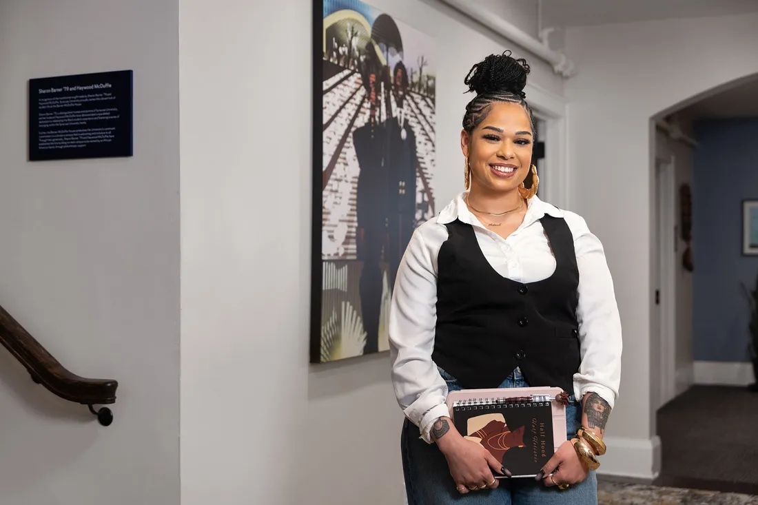 Darla Hobbs smiling inside the lender center.