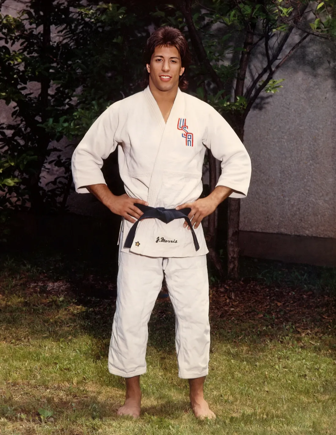Jason Morris standing in a karate outfit.