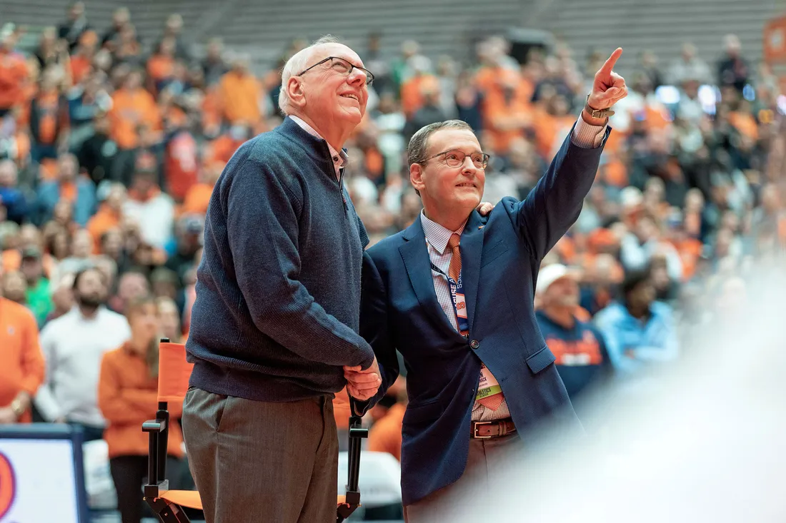 Jim Boeheim and John Wildhack standing together.