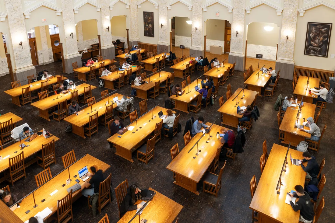 People working inside Carnegie Library.