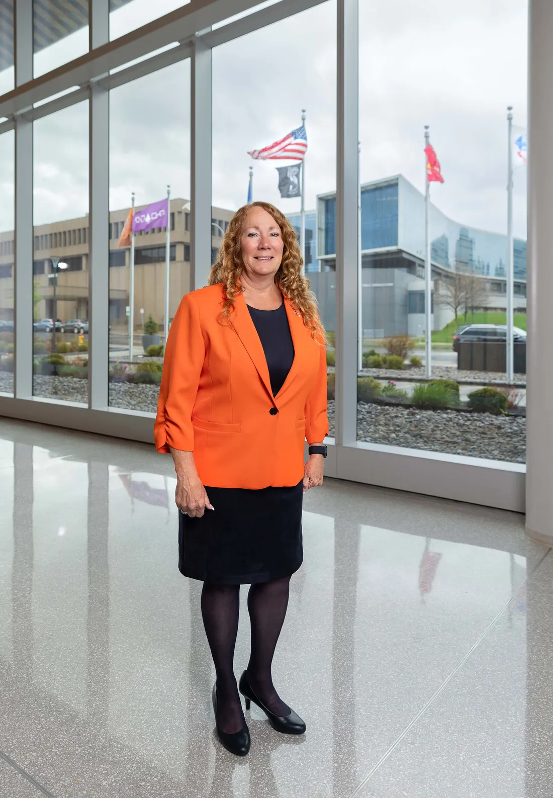 Peggy Combs standing inside the veterans center.