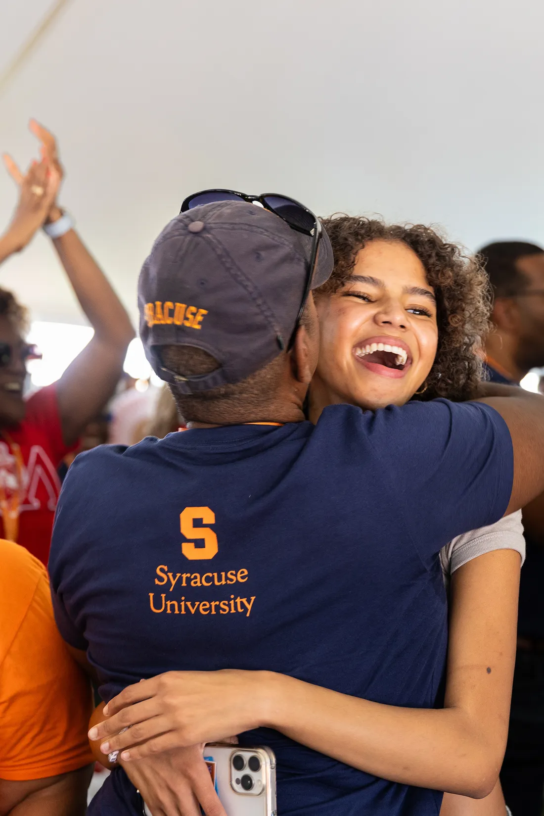 People embracing for a hug.