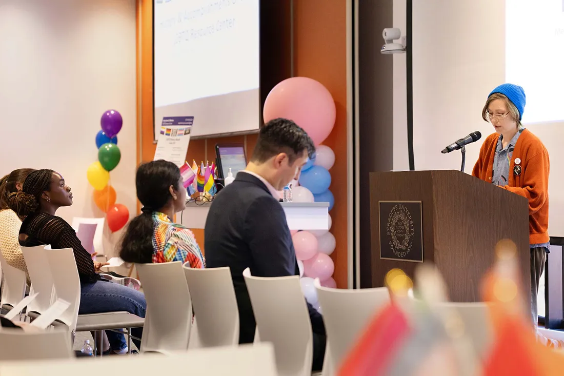 People sitting at the LGBTQ history month kickoff.