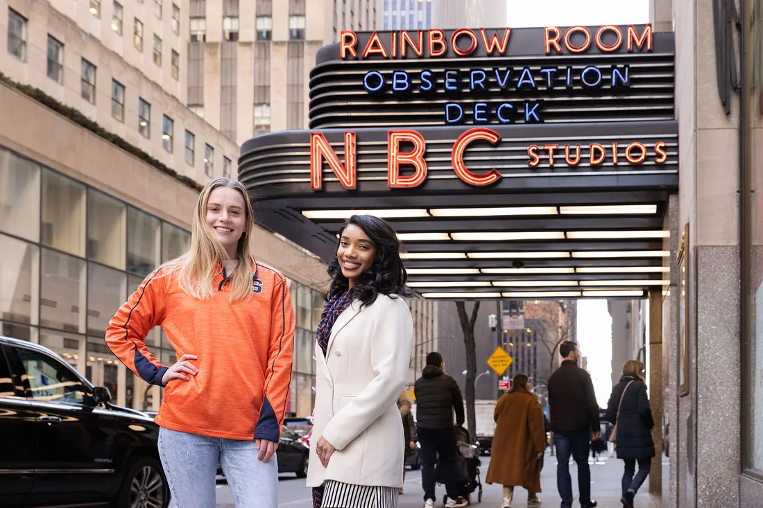 Two students pose outside of NBC studios in New York City.