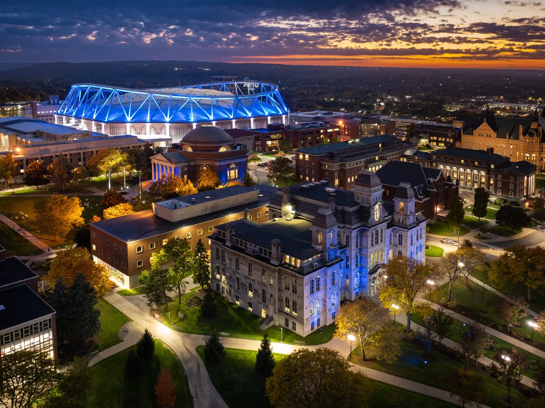 Campus lit up brightly at dusk.