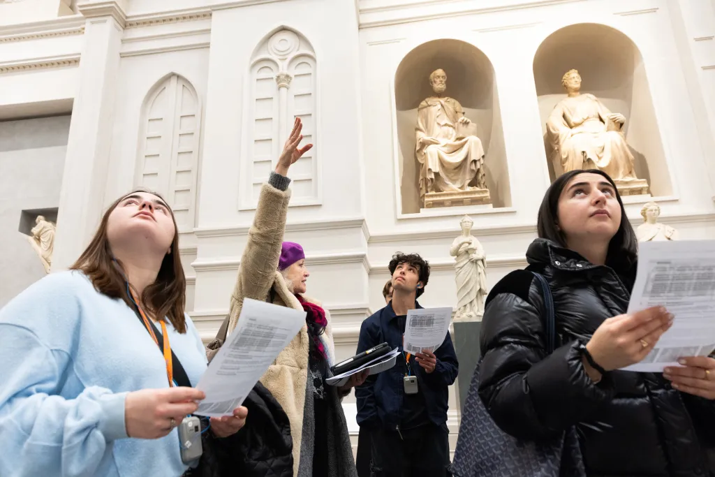 Students looking at sculptures well studying abroad in Florence, Itlay.